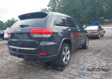 2014 Jeep Grand Cherokee Overland z USA, uszkodzony, nr VIN 1C4RJECGXEC198862